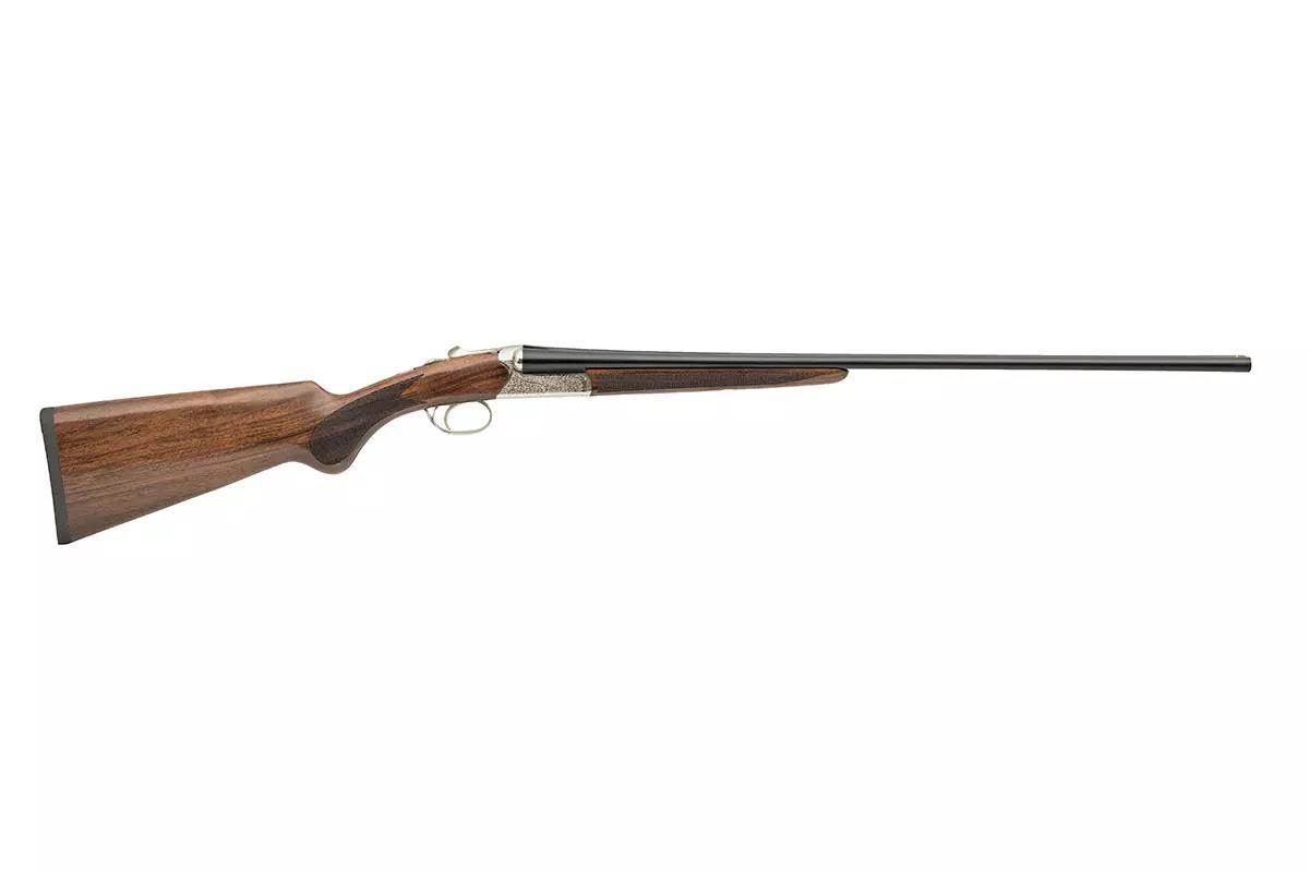 A Dickinson Sidelite seide-by-side shotgun on a white back ground.