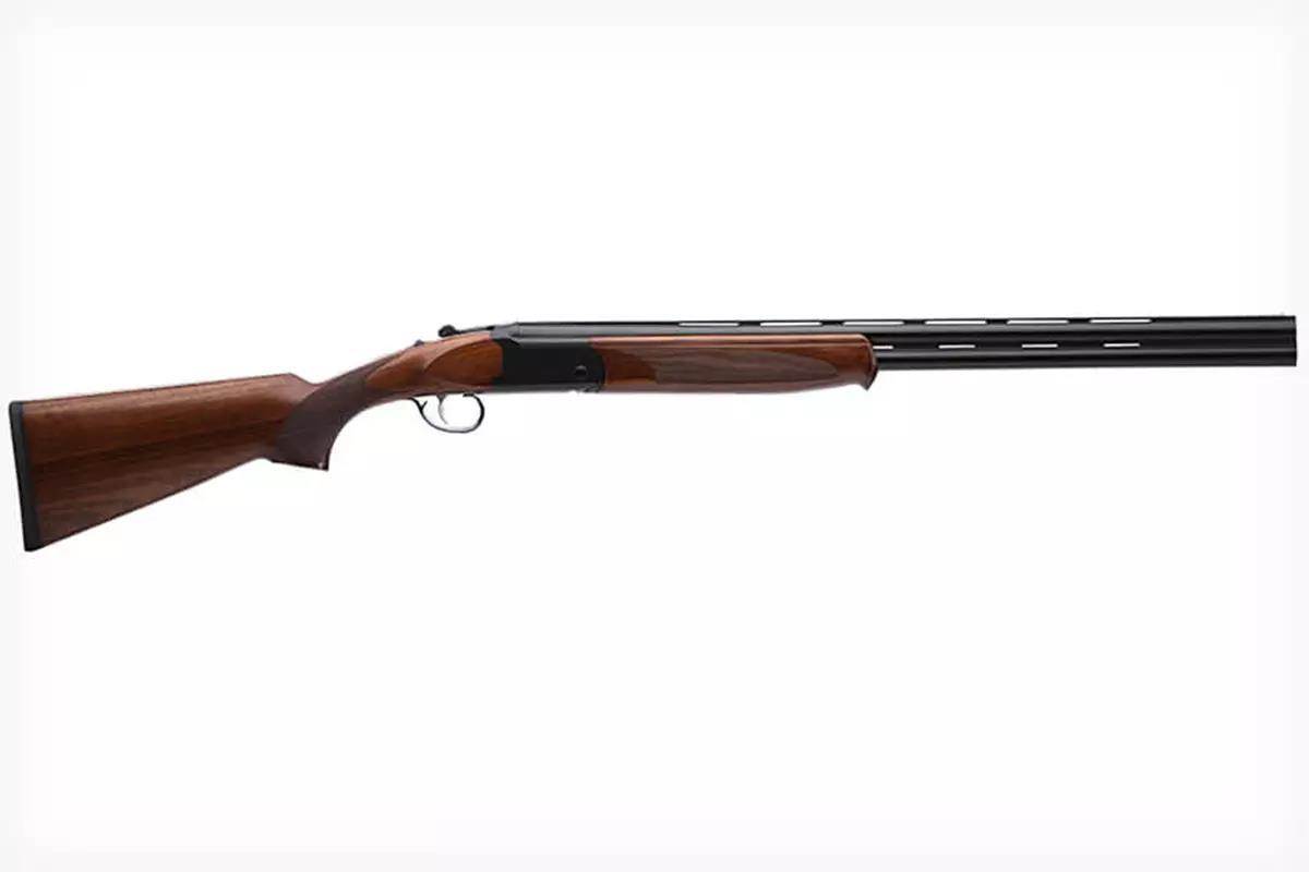 A Stevens 555 over/under shotgun on a white background.