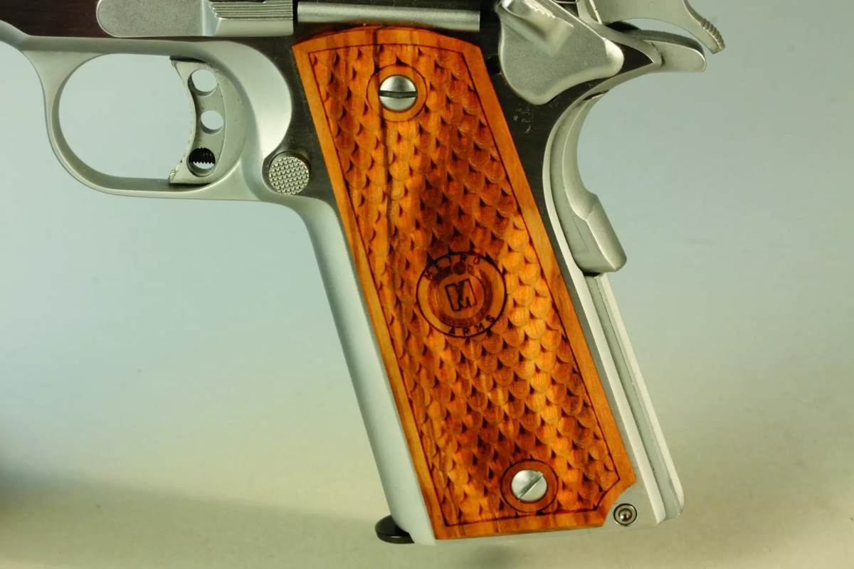 TriStar American Classic 1911 three-hole trigger and memory bump on the grip safety