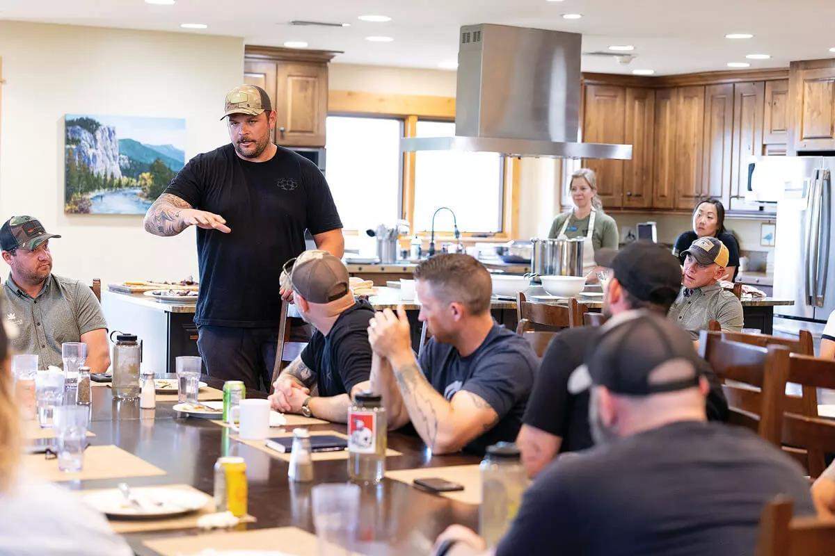 Warriors in kitchen waiting for meal