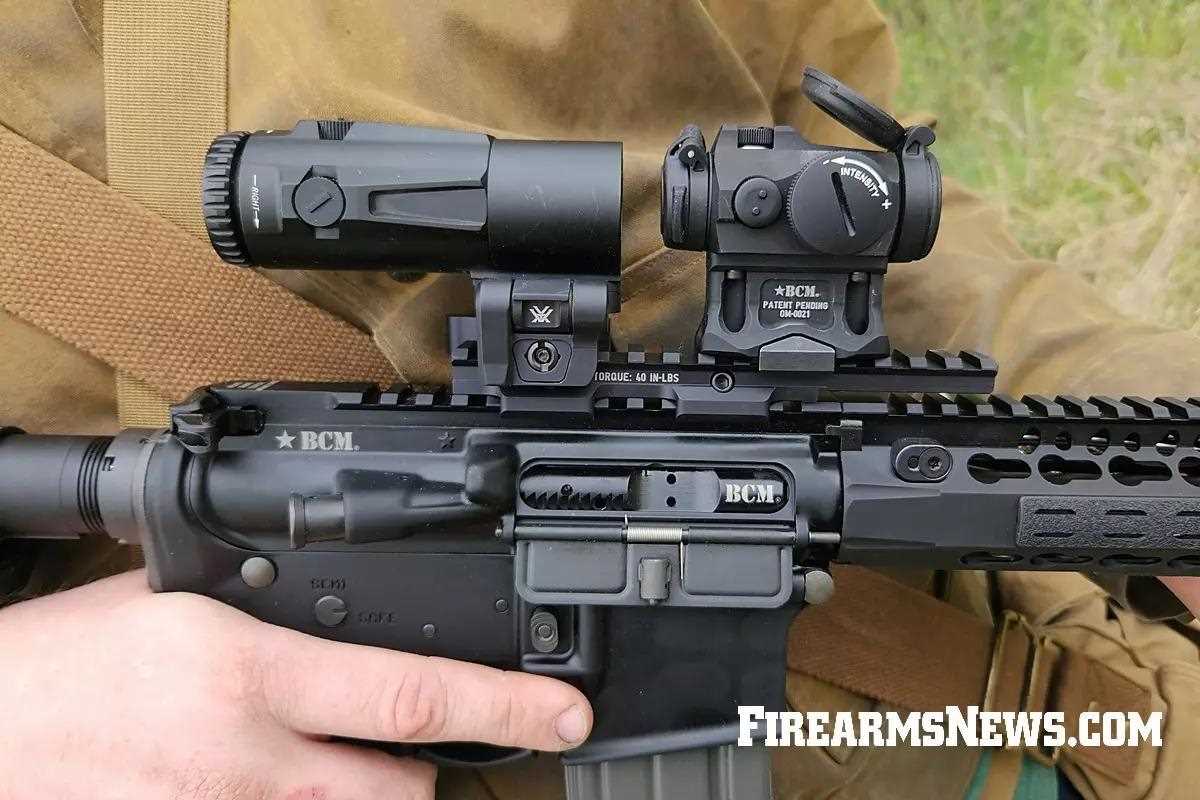 Magnifier and red dot mounted on AR-15 rifle