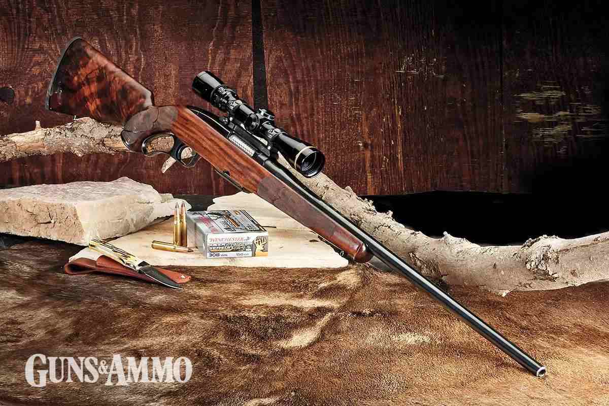 A Barrett .50-caliber M107 Sniper Rifle sits atop an observation point in  Afghanistan Solid-Faced Canvas Print