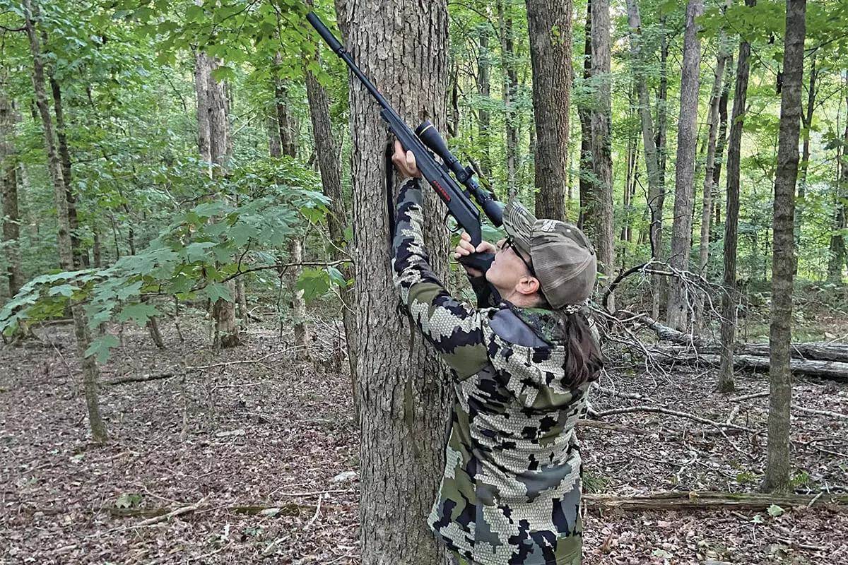 lady shooting squirrels