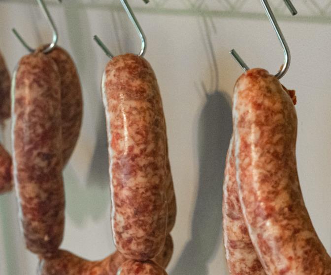 hanging venison sausages