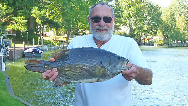 Angler Lands 9.98-Pound Michigan State Record Smallmouth Bass