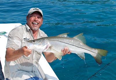 Henry Waszczuk with a snook, one of many species of fish available for anglers in Key West.